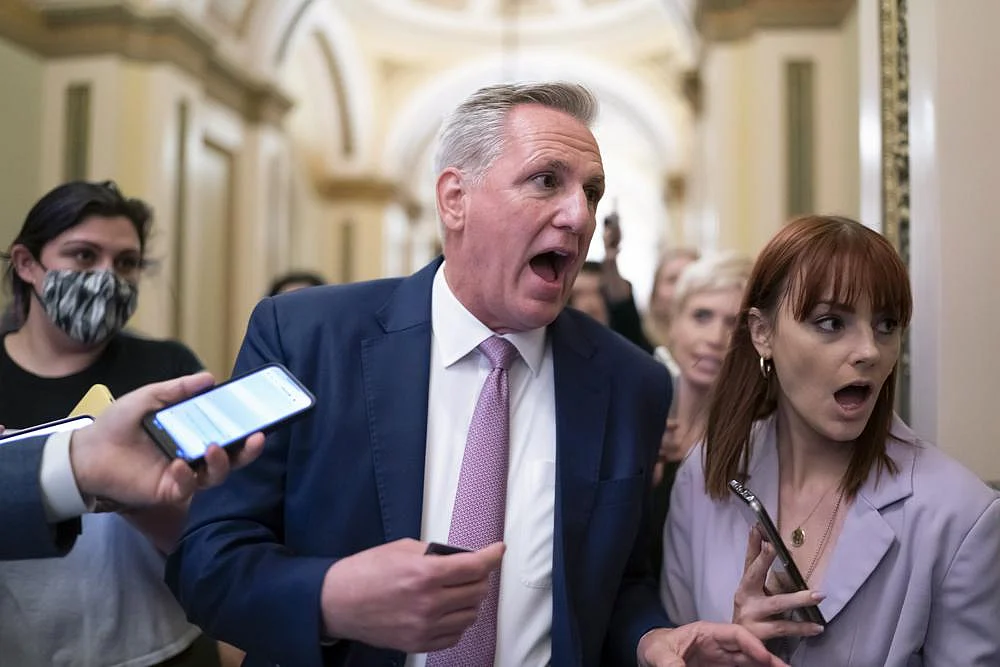 House Minority Leader Kevin McCarthy, R-Calif., heads to his office surrounded by reporters after House investigators issued a subpoena to McCarthy and four other GOP lawmakers as part of their probe into the violent Jan. 6 insurrection, at the Capitol in Washington, on Thursday, May 12, 2022 | AP