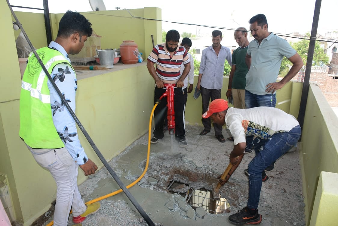 The fourth floor of which was demolished (R), in Ujjain on Monday FP PHOTOS