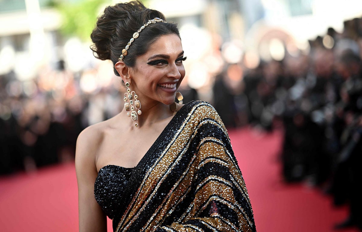 Cannes 2022: Deepika Padukone walks the red carpet in a black and golden Sabyasachi sari