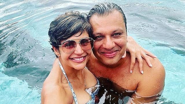 Mandira Bedi turns off comments after getting trolled for bikini picture with mystery man