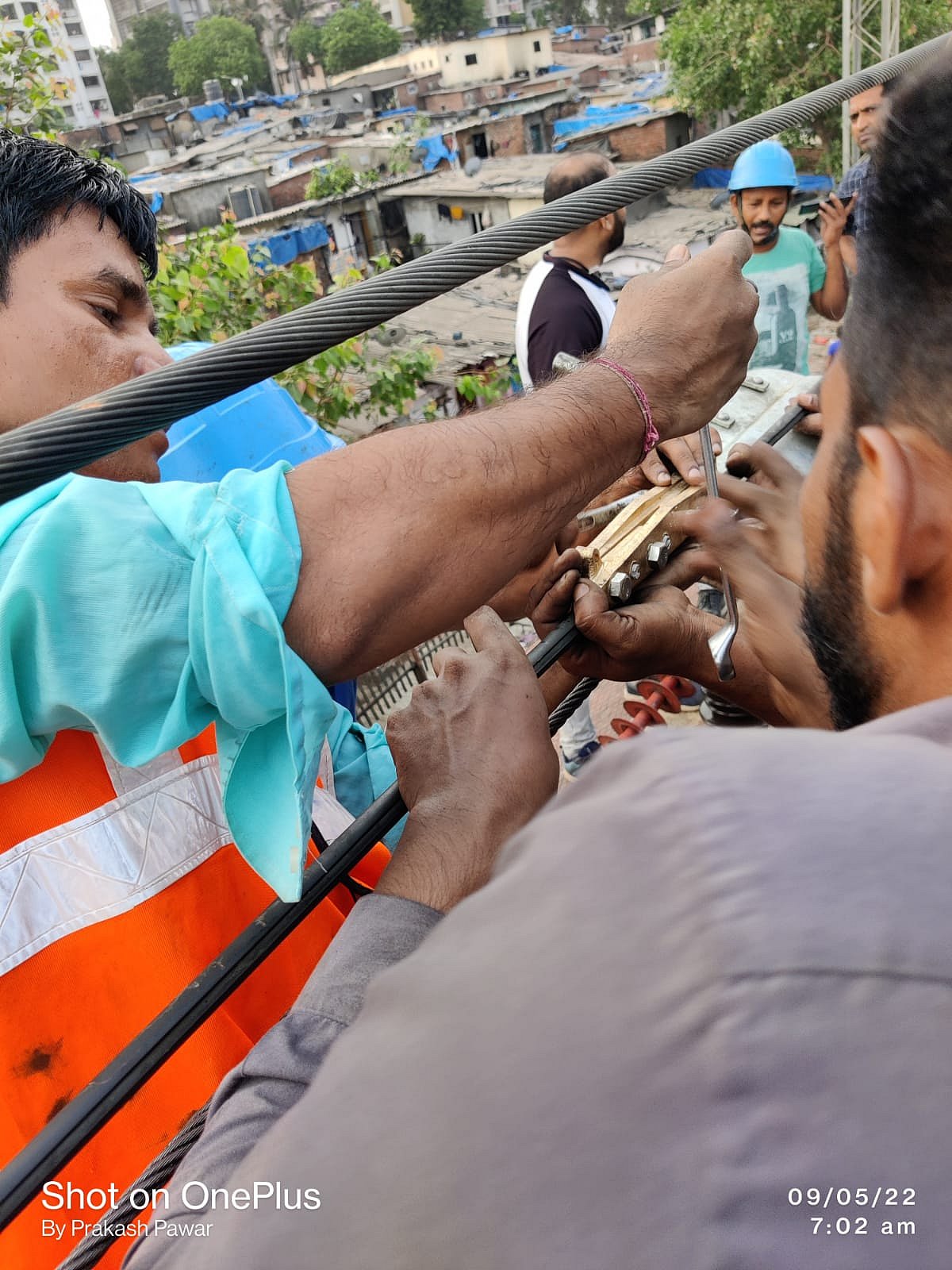 WR staff carry out repair works on the damaged OHE