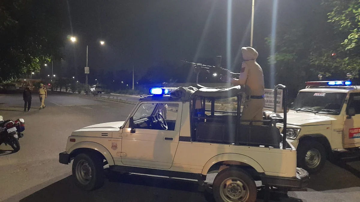 Mohali: A police personnel atop a vehicle stands guard after a blast outside the Punjab Polices intelligence department office in Mohali, Monday, May 9, 2022.  | (PTI Photo)