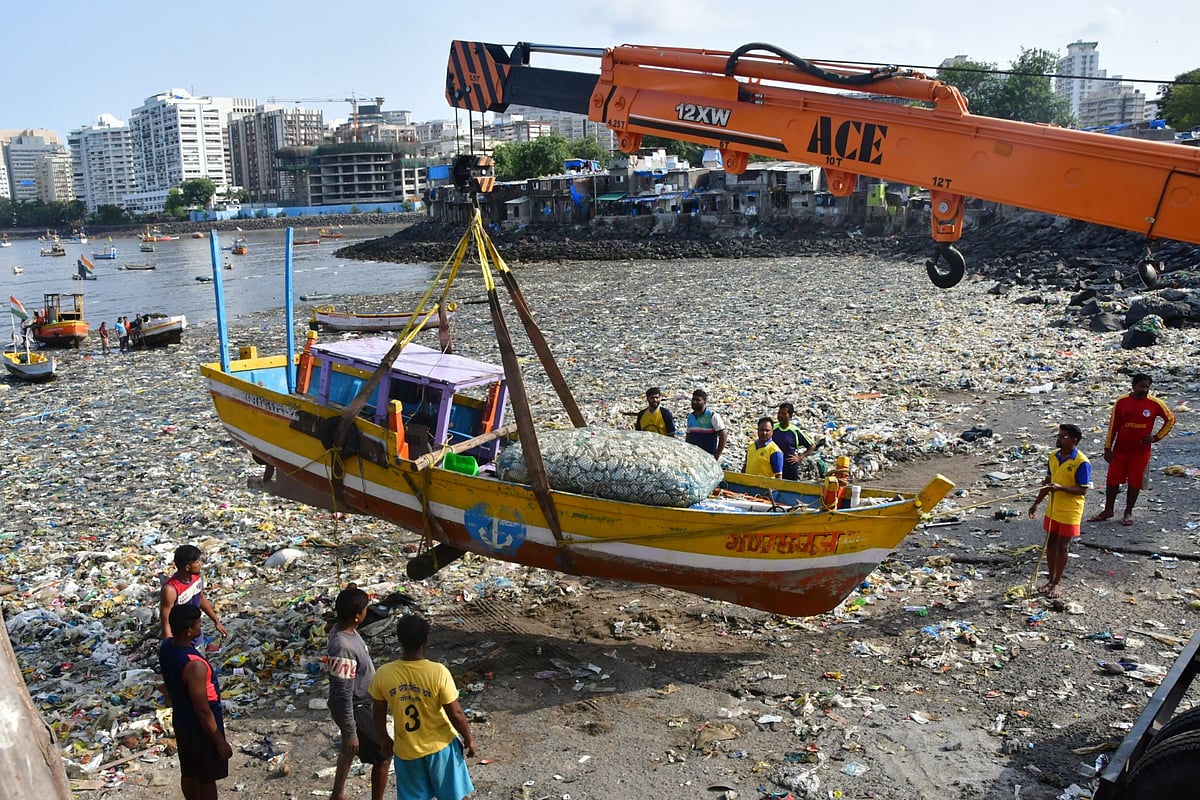 In Pics: Mumbai fishermen use crane to move their boats before monsoon starts