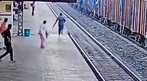 Watch video: Railway staff jumps on track to save a passenger
