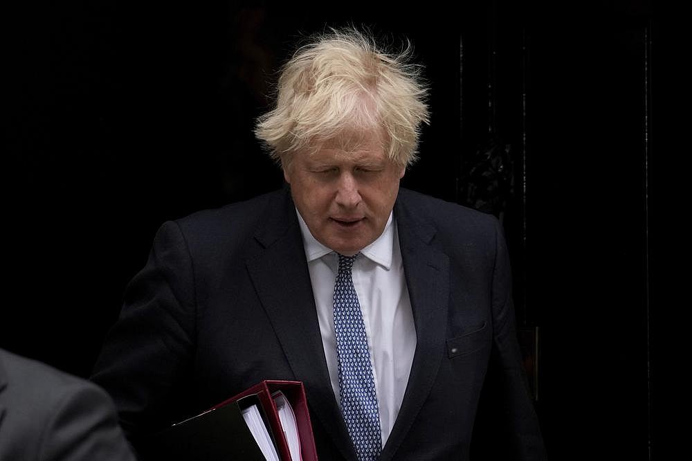 British Prime Minister Boris Johnson leaves 10 Downing Street to attend the weekly Prime Minister's Questions at the Houses of Parliament, in London, on Wednesday, May 25, 2022 | AP