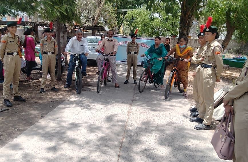 NCC cadets stage a street play to propagate the significance of cycling.