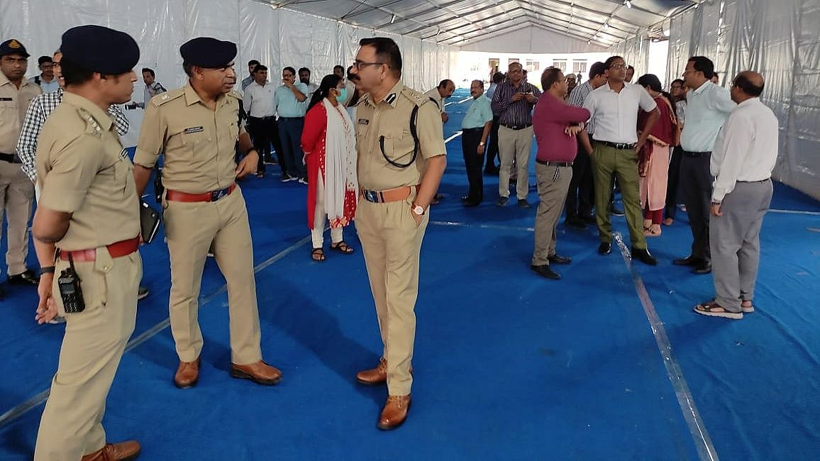 Senior administrative and police officials review arrangements at Ujjain Engineering College, in Ujjain on Monday | FP PHOTO
