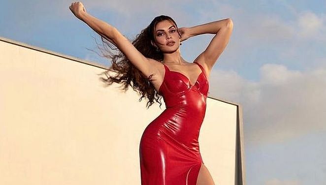 Jacqueline Fernandez is a diva to look out for in a hot red high slit dress