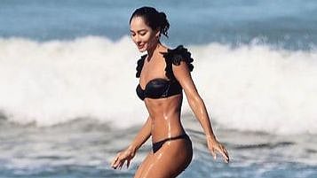 Photo: Lisa Haydon goes surfing in skimpy black bikini; Pooja Hegde calls her 'hottest mom on...