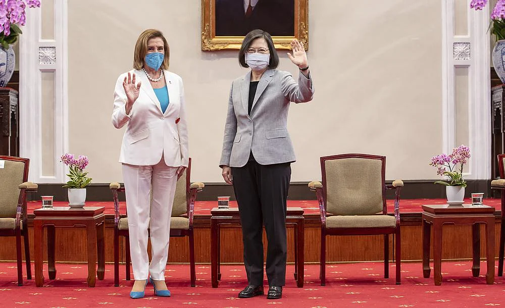 U.S. House Speaker Nancy Pelosi, left, and Taiwanese President President Tsai Ing-wen wave during a meeting in Taipei, Taiwan, Wednesday, Aug. 3 | AP