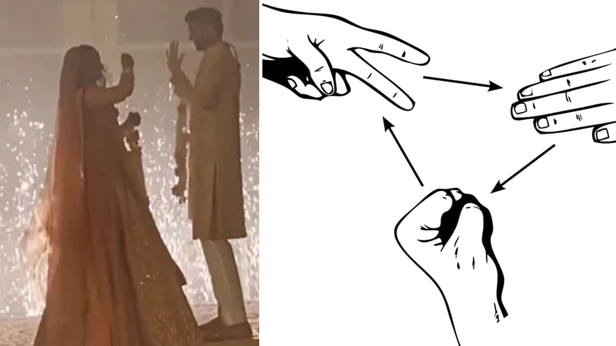Watch: Bride and groom play 'stone paper scissors' during varmala ritual; netizens say 'aww, how sweet'