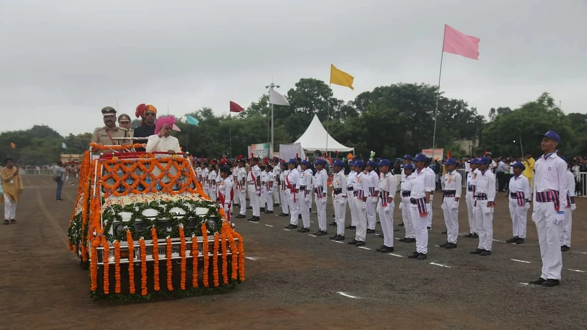 District in-charge minister Jagdish Deora takes a salute from joint parade participants during the main I-Day function in Ujjain. | FP Photo