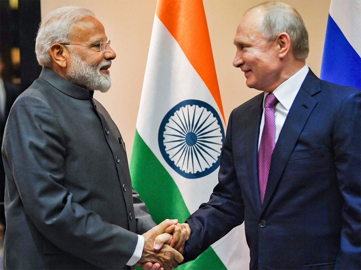 Prime Minister Narendra Modi, left and Russian President Vladimir Putin | PTI