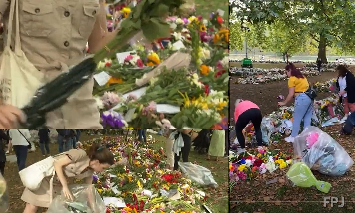 Watch: Volunteers remove plastic wrapping from thousands of bouquets left for Queen Elizabeth