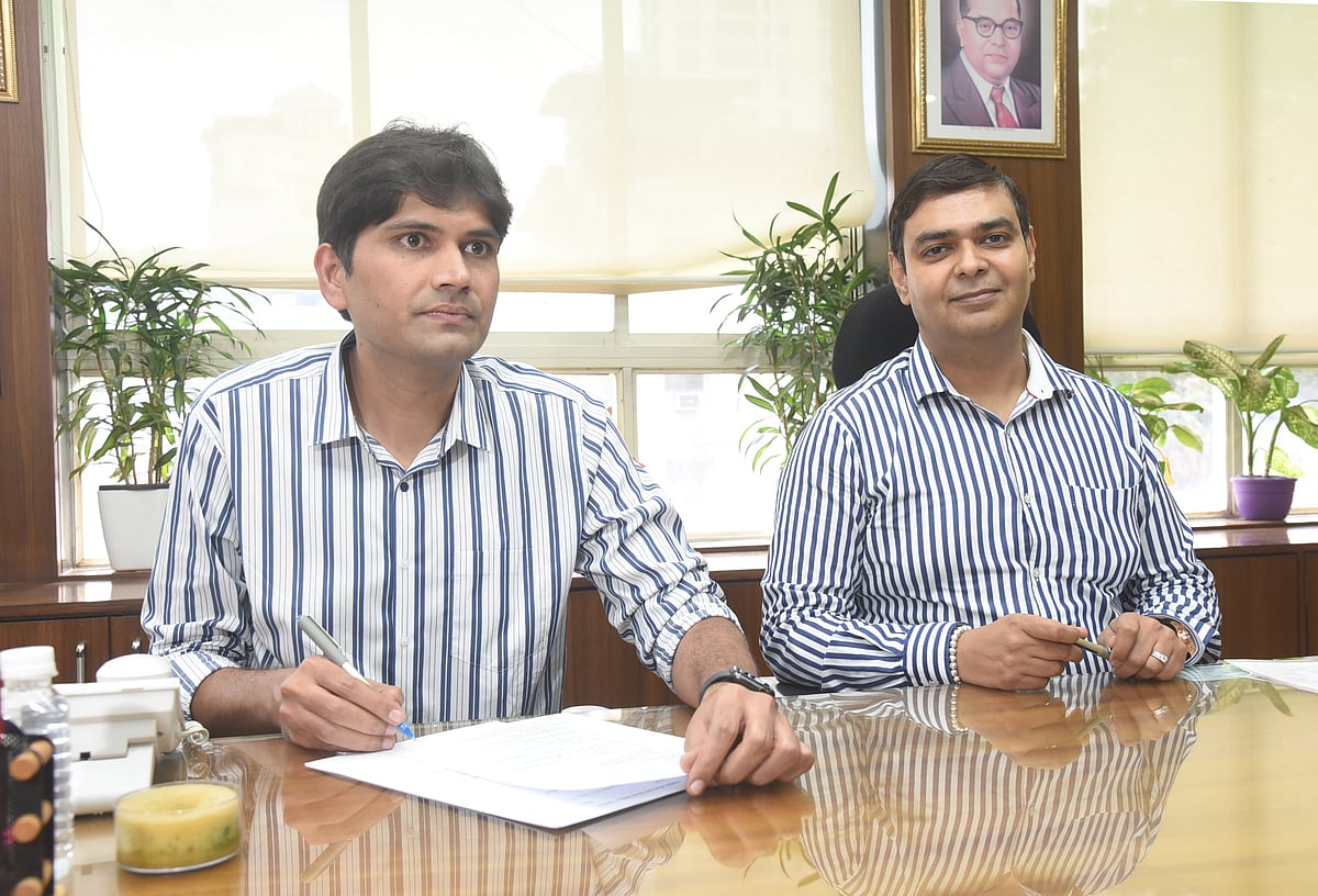 Abhijit Bangar (in left)