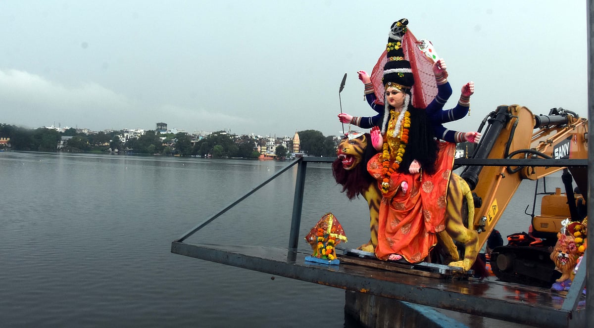 JCB machine being used for the Durga idol immersion in Bhopal.