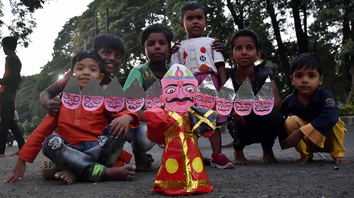 Kids with smallest effigy of Ravana about 1ft being sold at at Link Road -2 in state capital. 
