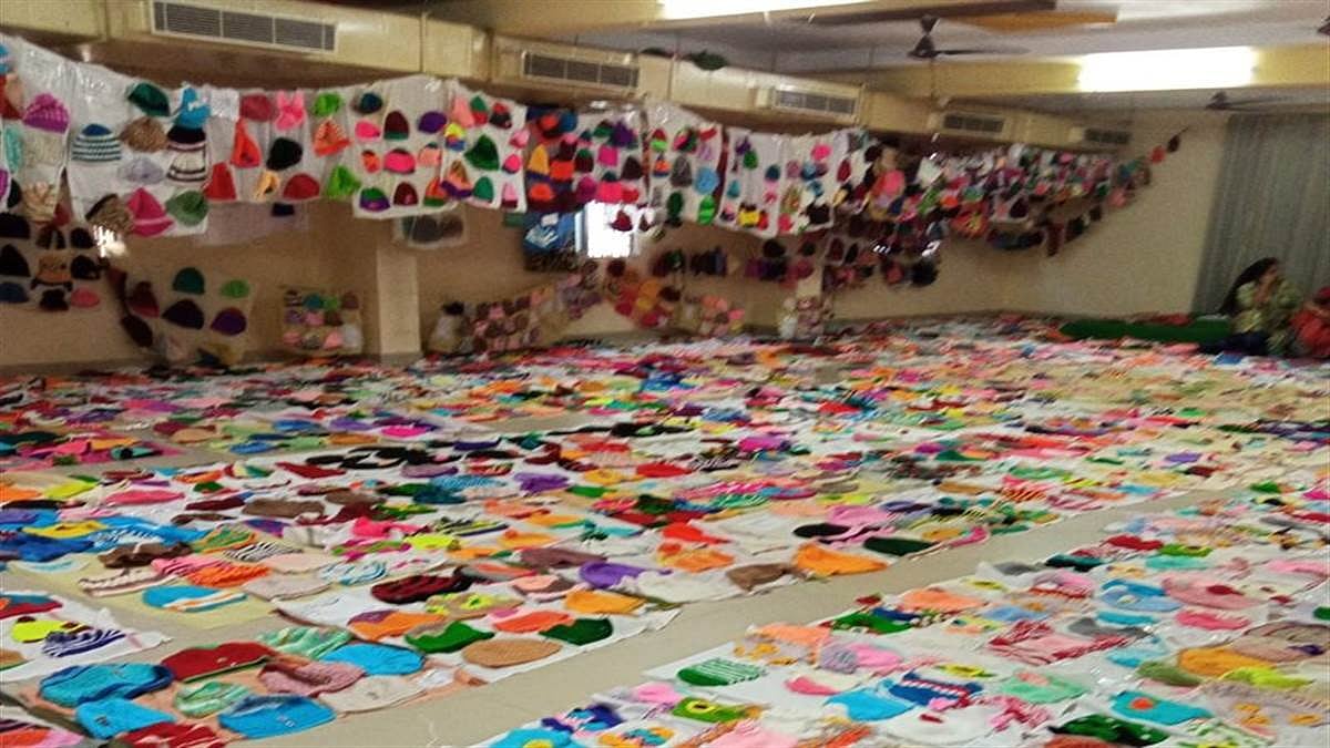 ‘KNIT’TING A GUINNESS FEAT: Group of local women stitches 4700 woollen caps in Jhabua