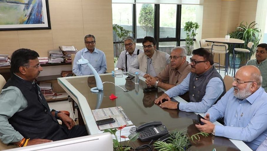 Office bearers of Pithampur Audhyogik Sangathan meet MPIDC MD Manish Singh at AKVN office in the city on Friday. | FP Photo