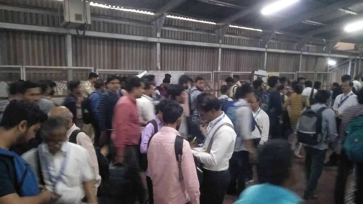 Ticket checker Checking ticket at Thane on Monday | 