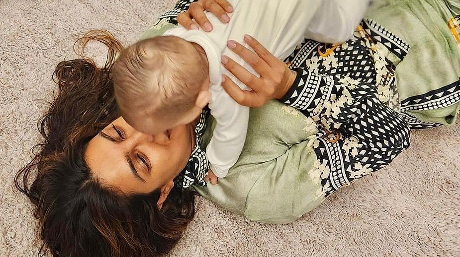 Priyanka Chopra holds daughter Malti Marie in her arms as she returns to LA home |
