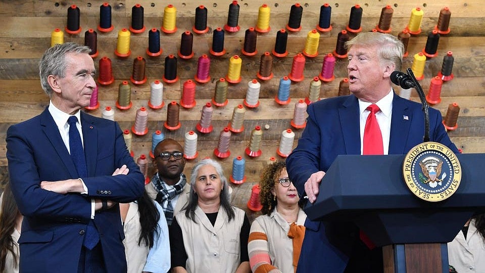 Former U.S President Donald Trump and Arnault in 2019