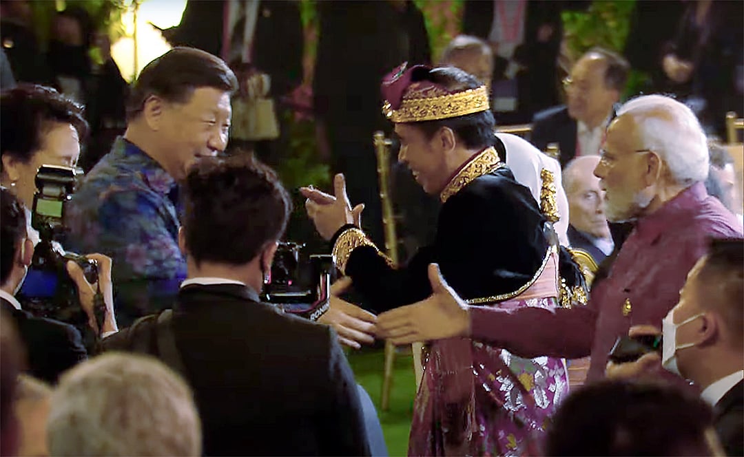 Prime Minister Narendra Modi met Chinese President Xi Jinping at the Welcoming Dinner during the G20 Leader's Summit, at Garuda Wishnu Kencana Cultural Park, Badung, in Bali. (ANI Photo)