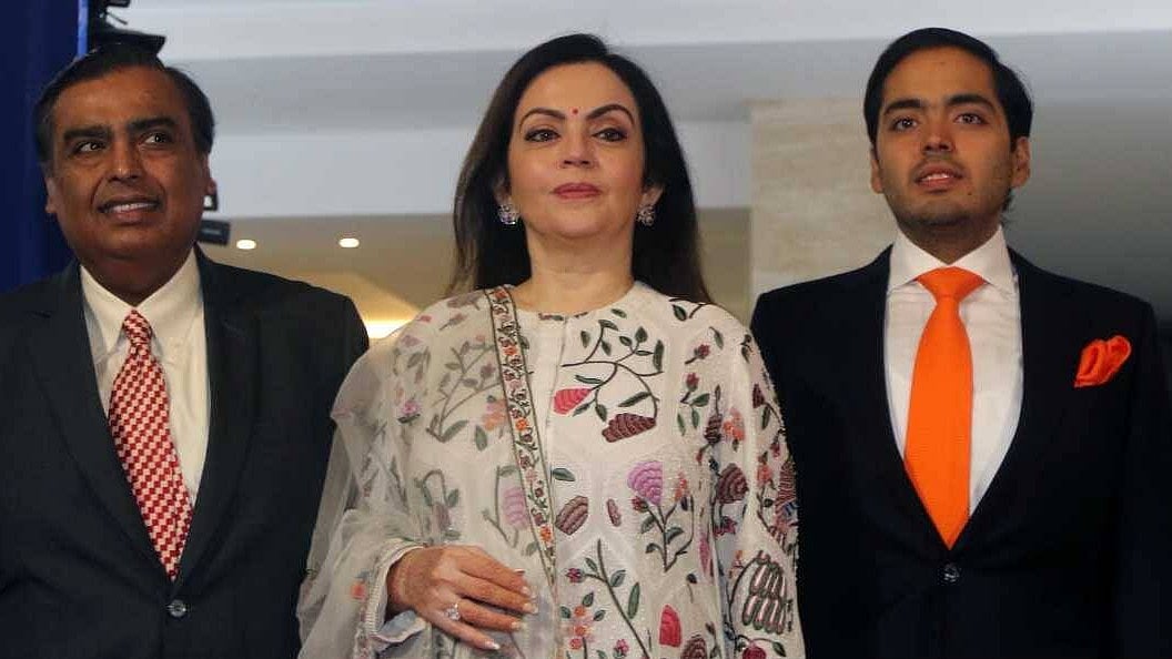 Mukesh Ambani with wife Nita Ambani and son Anant Ambani