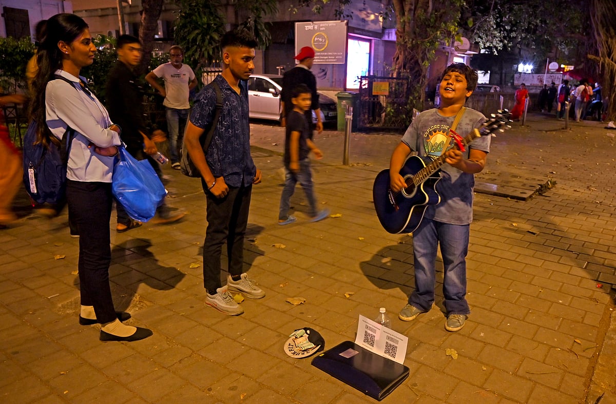 He arrives at Churchgate by 06:30 each evening and earns between Rs700 and Rs1,200 each day.