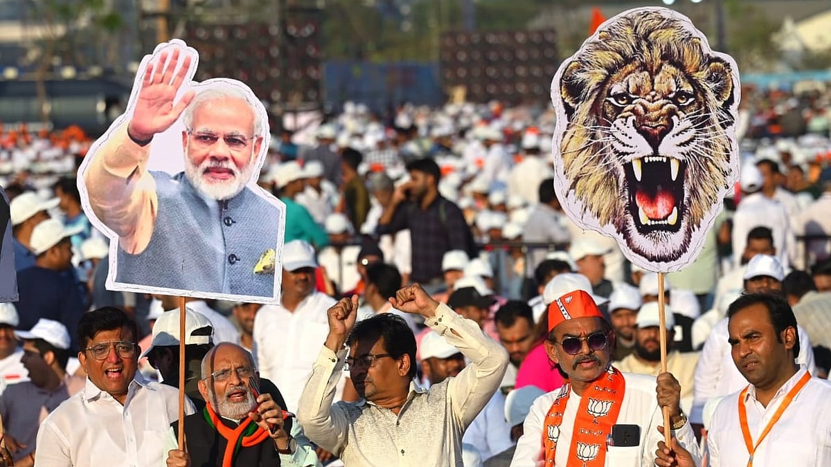 Supporters gather at the BKC ground before PM Modi's address. 
