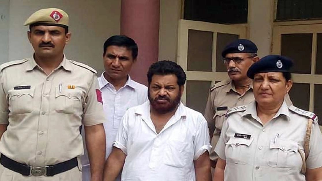 Jalebi Baba after being arrested by Haryana police. 