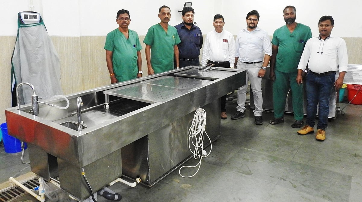 The doctors and staff of the South Goa district hospital mortuary led by Dr Madhu S Ghodirekar manning the mortuary unit. | The Goan