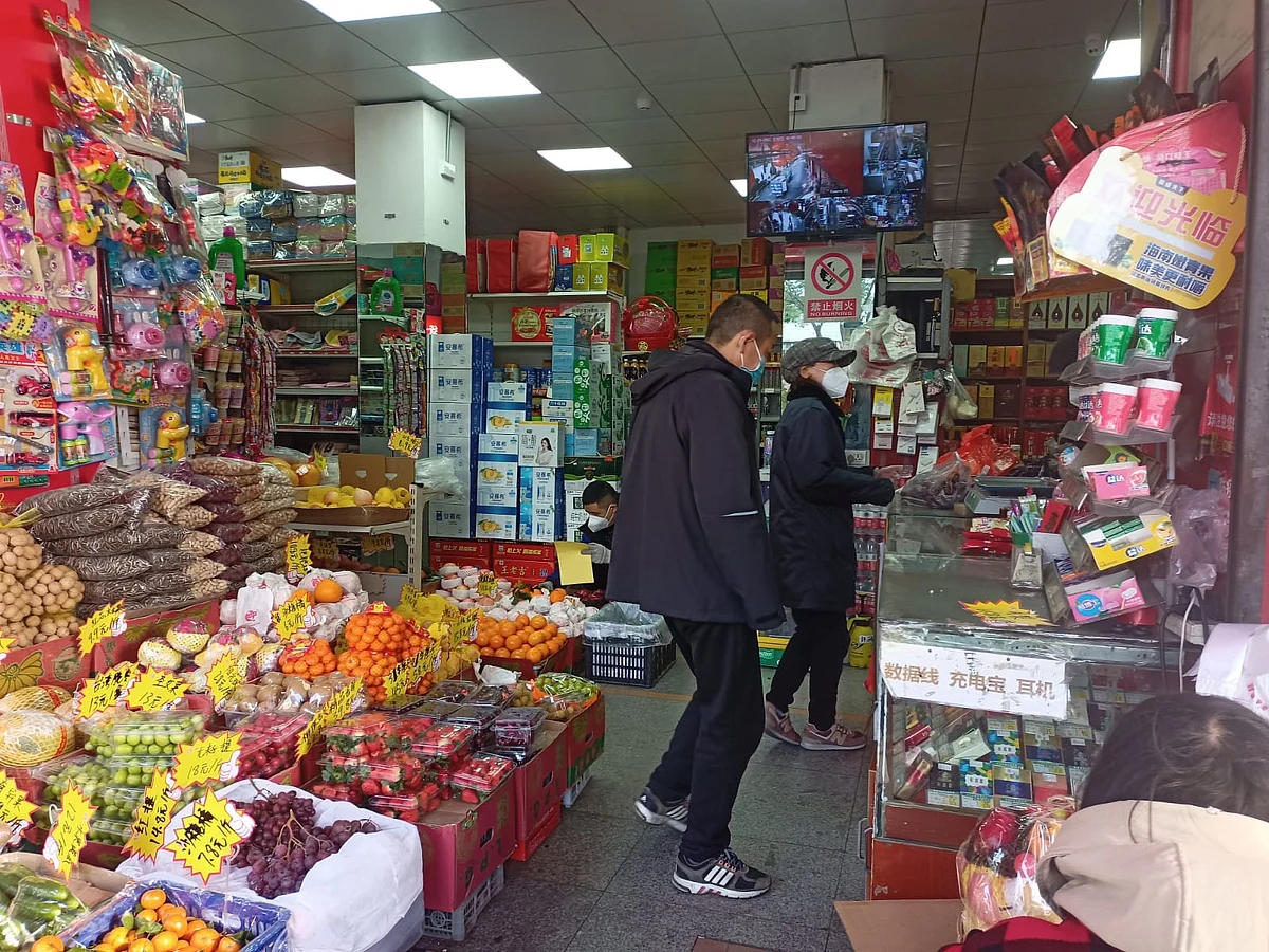 People wearing masks inside supermarkets in China