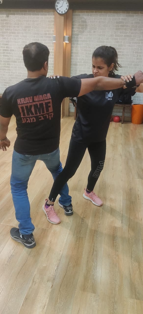 Trip the attacker to the ground by hitting the back of his leg with a strong sweep