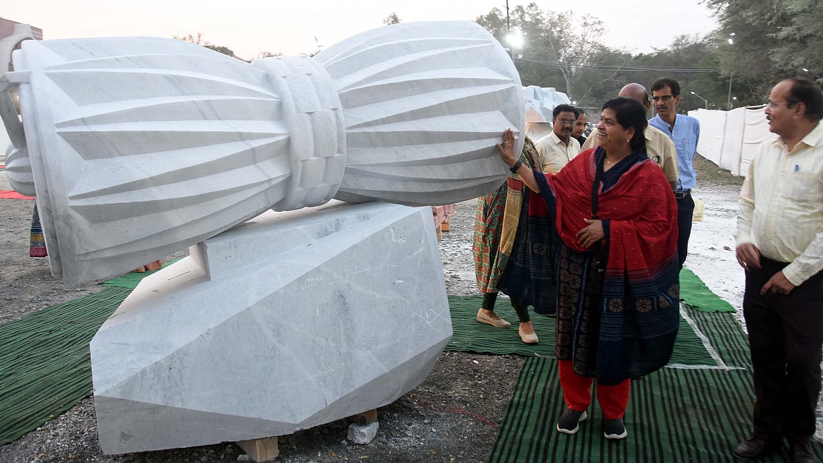 Culture minister Usha Thakur seeing an artwork ‘Damroo,’ by Robin David at Nilambari Maidan on the premises of Ravindra Convention Centre in the city on Tuesday evening.