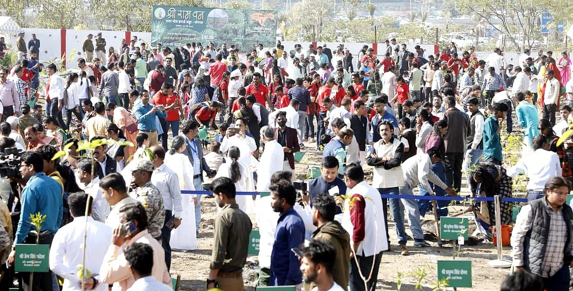 People plant saplings at Shri Ram Aastha Van' in Bhopal on Sunday