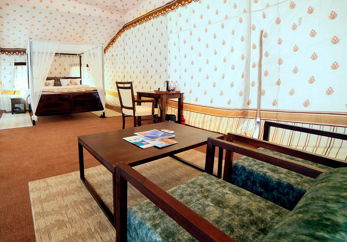 Each tent includes a double bed, a spacious front porch, attached bathroom, cosy sitting area, air conditioner and tea/coffee maker.