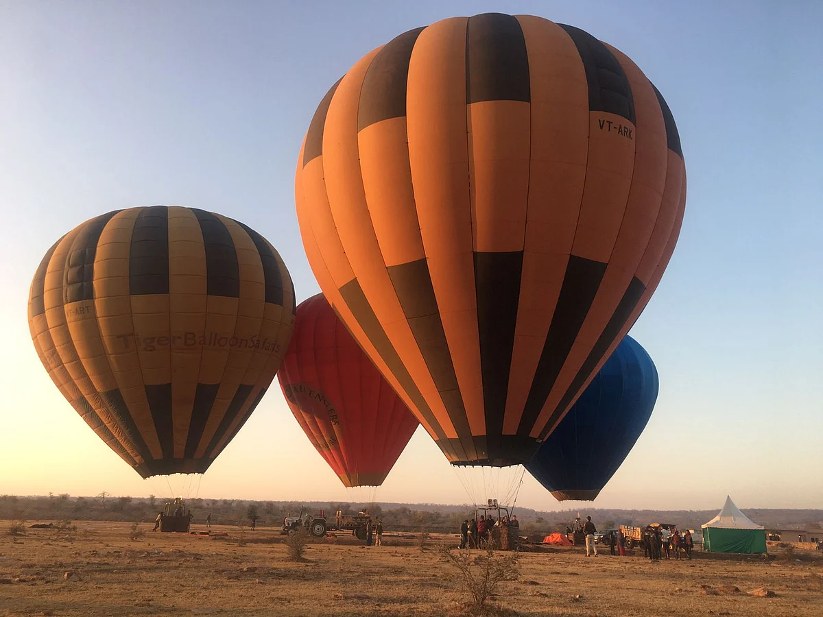Tourists are enjoying air adventure activities including parasailing, paramotoring and hot air ballooning