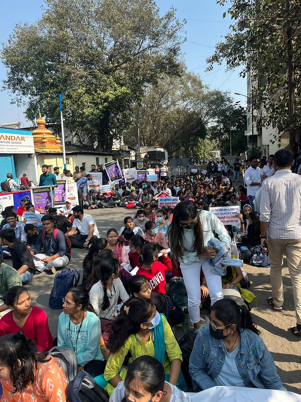 To protest against the State’s decision to conduct the examination with a new pattern in 2025, a section of students staged a protest in Alka Talkies chowk in Pune on Friday.