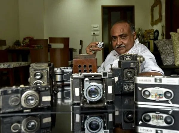 Dilish Parekh shows some of the vintage cameras in his collection