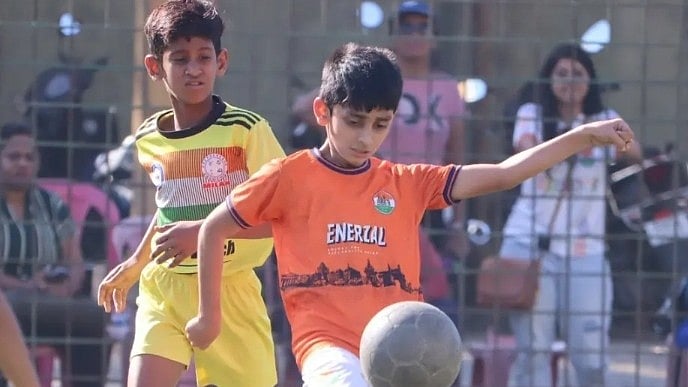 A Rurdra FC player (right) and an Elever Star player clash for ball possession during their YPL boys’ under-11 match organised by MFA |
