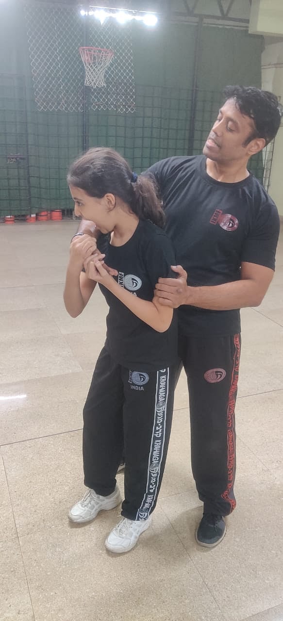 In this situation, scratch the arm down and bite the kidnapper