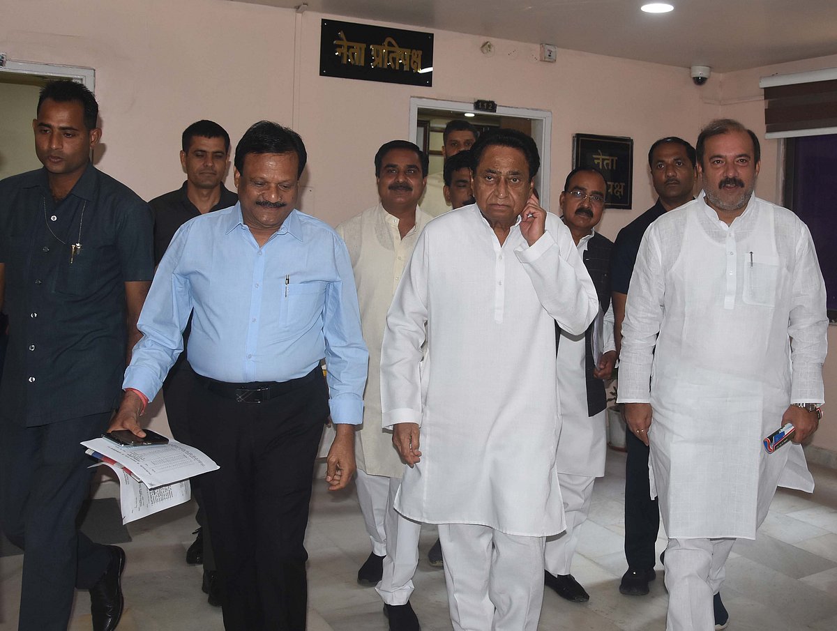 Former CM Kamal Nath with party MLAs Sajjan Singh Verma, Tarun Banot in Vidhan Sabha on Thursday.