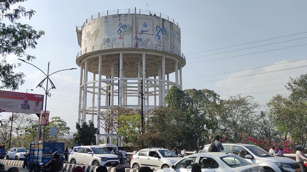 Watch: Citing land encroachment threats by mafia, Bhopal man, with his elderly mother, climbs a water-tank