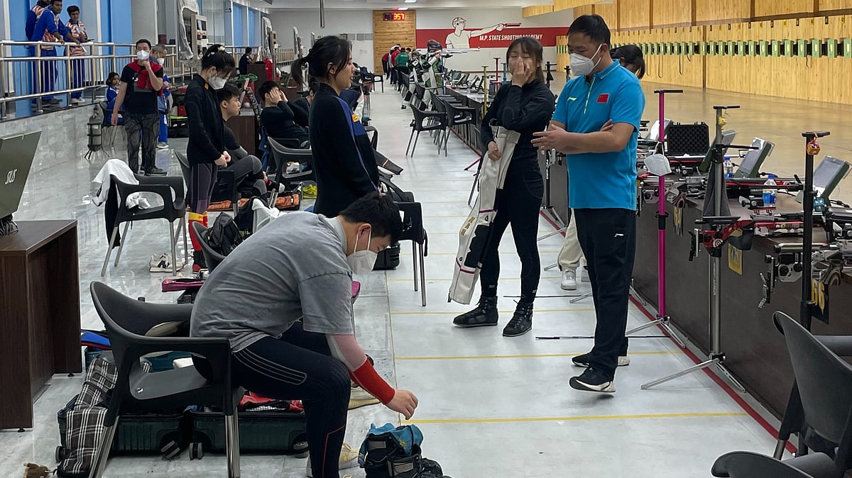 Members of the Chinese contingent in unofficial practice at the M.P. State Academy Shooting range in Bhopal, Madhya Pradesh on Sunday, March 19, 2023.