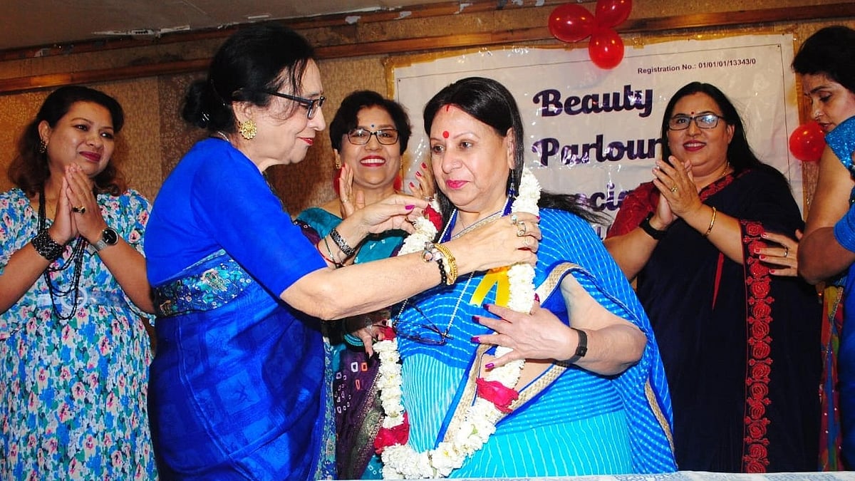 Neeta Trivedi (left) felicitating Sarita Shrivastava after electing president of Bhopal Beauty Parlour fourth time at an event in the city on Saturday.