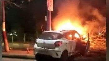 Indore: Car collides with tree, catches fire