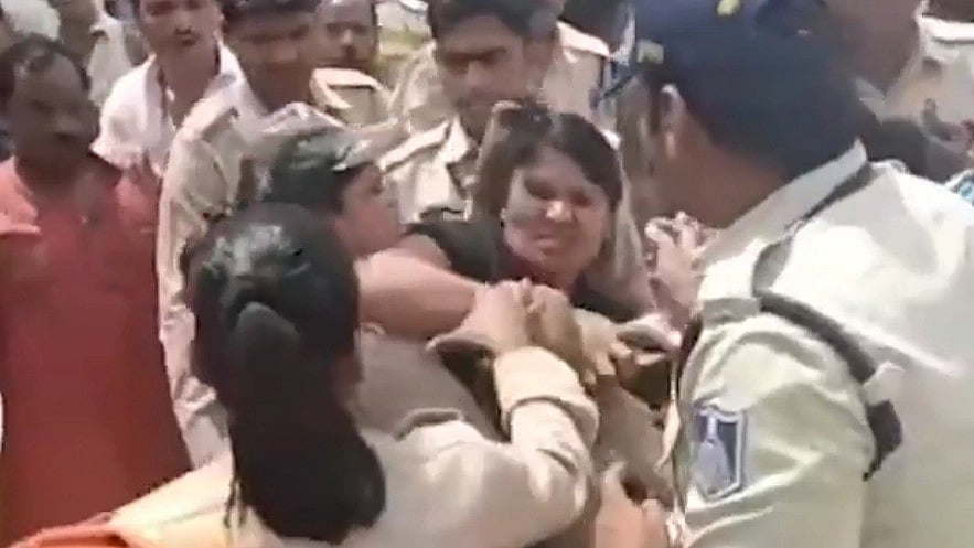 WATCH: Lady bouncer and woman cop get into a cat fight at Pradeep Mishra's katha in Ujjain, pull...
