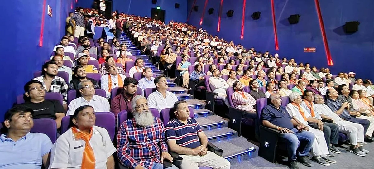 A group of people attend a programme organized for
broadcast of PM Narendra Modi’s ‘Mann Ki Baat’ at a multiplex
in Sapna-Sangeeta area on Sunday.