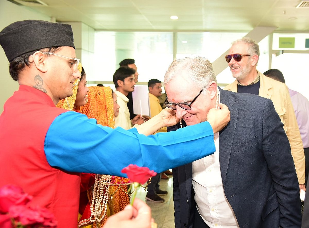 G 20 delegates being welcomed at  Jollygrant Airport in Uttarakhand.